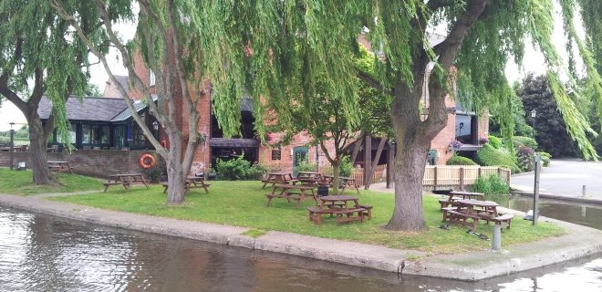 Canal-Side Pub with Seating